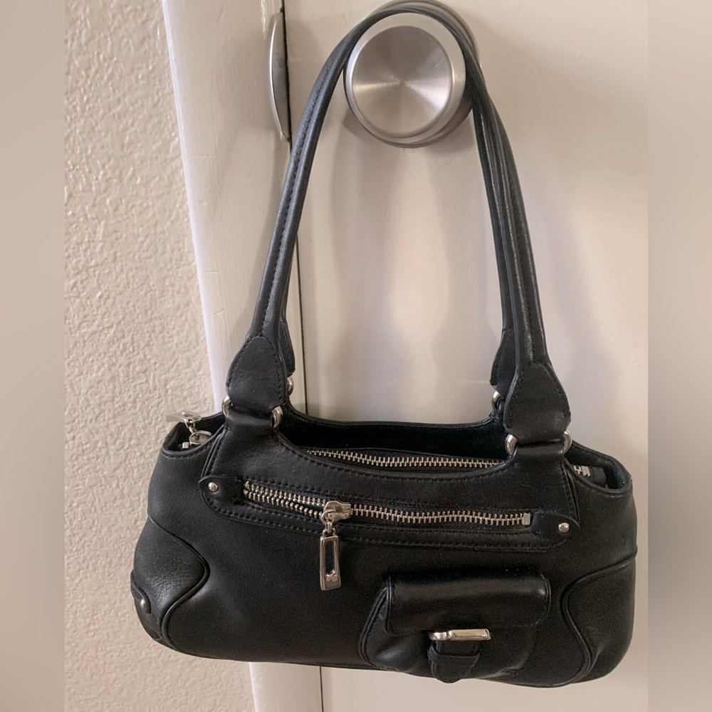 Cole Haan  black leather purse / bag.  Pristine condition .. a very nice purse